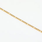 Pulseira anklet Figaro de 3mm da Wulgor, feita em metal prateado com acabamento elegante, visível na imagem.