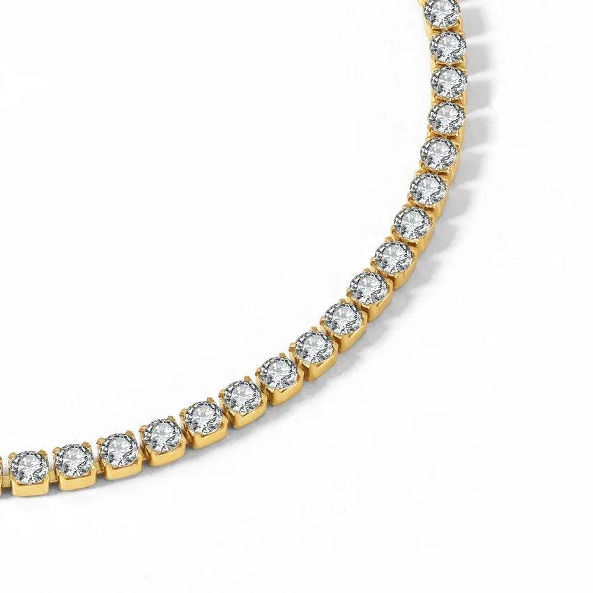 Tennis anklet de 2mm da Wulgor, pulseira delicada de prata para tornozelo, com detalhes em forma de bolas de tênis.